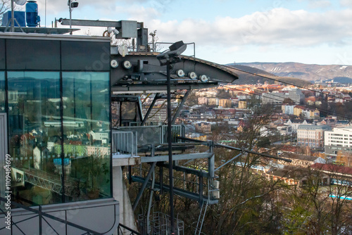 Czech Republic Usti nad Labem 23.11.2024. Cable car cabin over blue sky with clouds.  photo