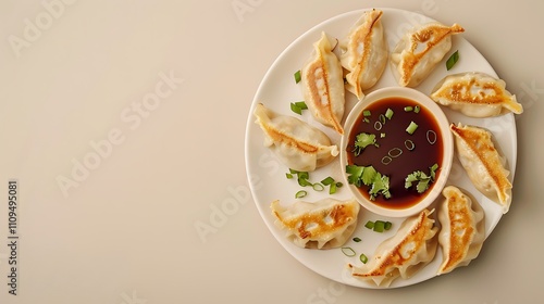 Wallpaper Mural A serving of traditional Chinese dumplings with a light soy dipping sauce, arranged on a white plate with a clean beige background and ample empty space Torontodigital.ca