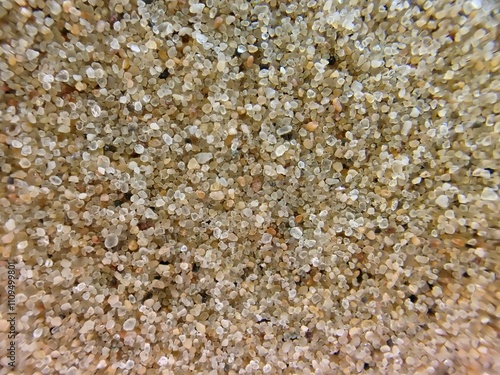 Foto Makro Aufnahme am Sandstrand als Hintergrund mit Vignette