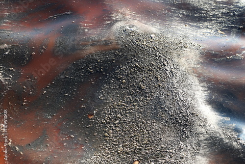 Abstract Image of Polluted Water Surface with Oily Patterns