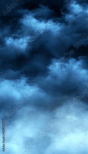 Dark blue stormy cloudscape at night.