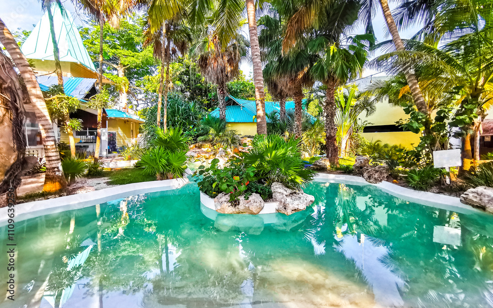 Obraz premium Tropical pond pool at the restaurant in nature Cancun Mexico.