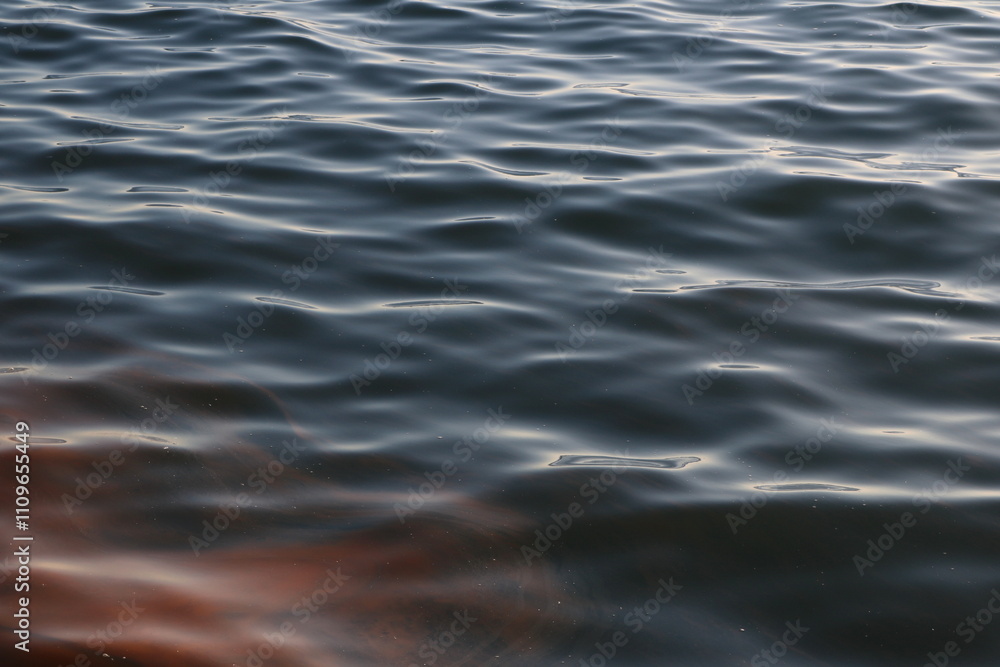 Abstract Image of Polluted Water Surface with Oily Patterns Abstract Image of Polluted Water Surface with Oily Patterns