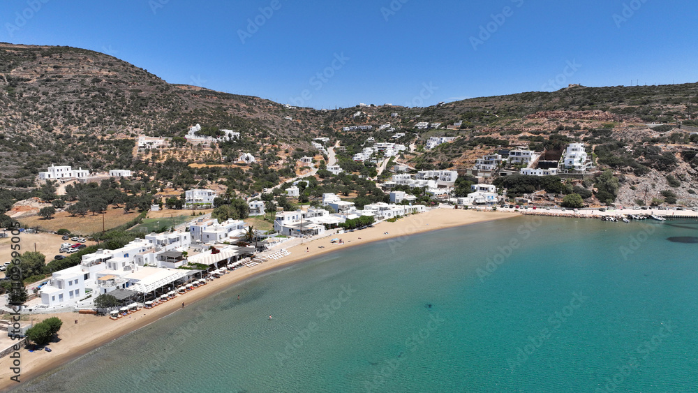 Aerial drone photo of famous beach ideal for families
and small seaside village of Platy Gialos, Sifnos island, Cyclades, Greece Aerial drone photo of famous beach ideal for families
and small seaside village of Platy Gialos, Sifnos island, Cyclades, Greece