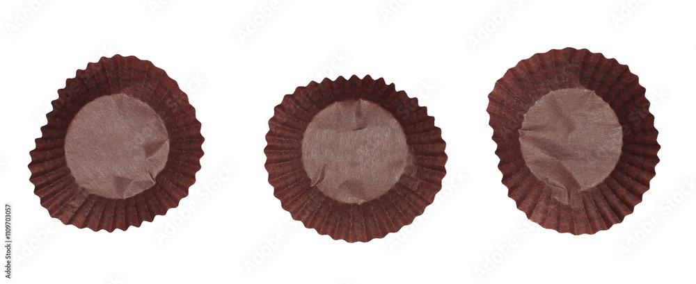Empty chocolate and cupcake wrapping paper garbage for recycling isolated on white background
Empty chocolate and cupcake wrapping paper garbage for recycling isolated on white background