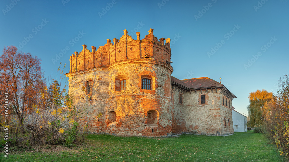panoramic view to crown shape tower of old castle in sunset light in Starokonstantiniv city in Ukraine panoramic view to crown shape tower of old castle in sunset light in Starokonstantiniv city in Ukraine