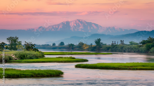 Serene river delta with distant mountains. photo