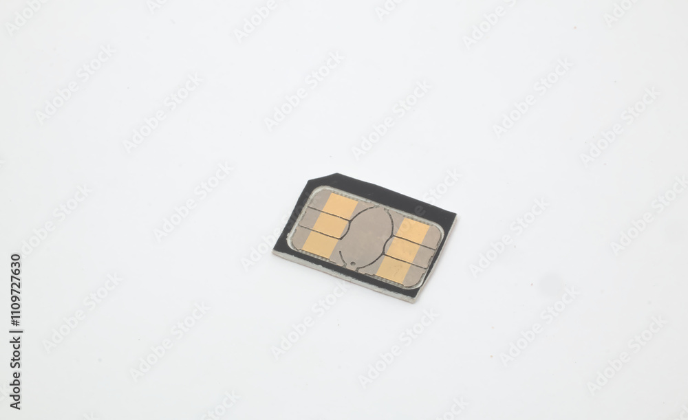 A SIM card on a white background. A SIM card (Subscriber Identity Module) is a smart card that functions to store the telecommunications service provider identifier on a mobile phone device. A SIM card on a white background. A SIM card (Subscriber Identity Module) is a smart card that functions to store the telecommunications service provider identifier on a mobile phone device.