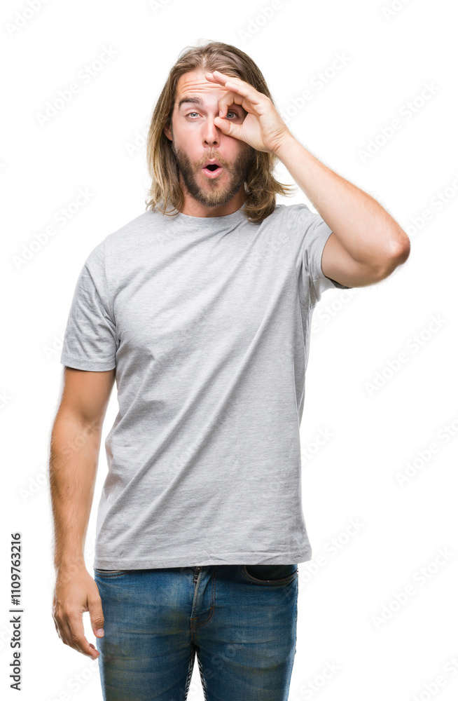 Young handsome man with long hair over isolated background doing ok gesture shocked with surprised face, eye looking through fingers. Unbelieving expression. Young handsome man with long hair over isolated background doing ok gesture shocked with surprised face, eye looking through fingers. Unbelieving expression.