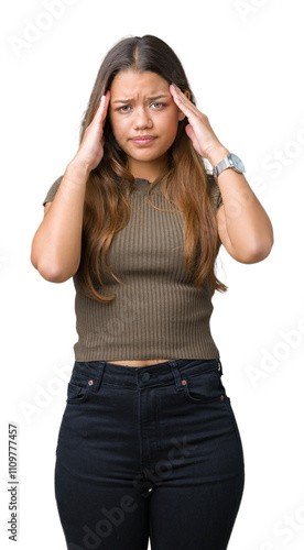 Young beautiful brunette woman over isolated background with hand on head for pain in head because stress. Suffering migraine.