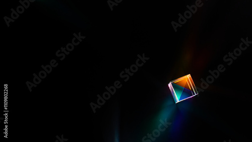 Obraz na płótnie A glass dichroic prism on a black background w salonie
