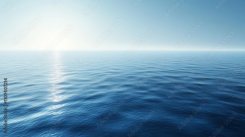 Obraz premium A tranquil ocean stretches endlessly toward the horizon under a clear sky, symbolizing peace, freedom, and the infinite possibilities of nature's vast expanse.