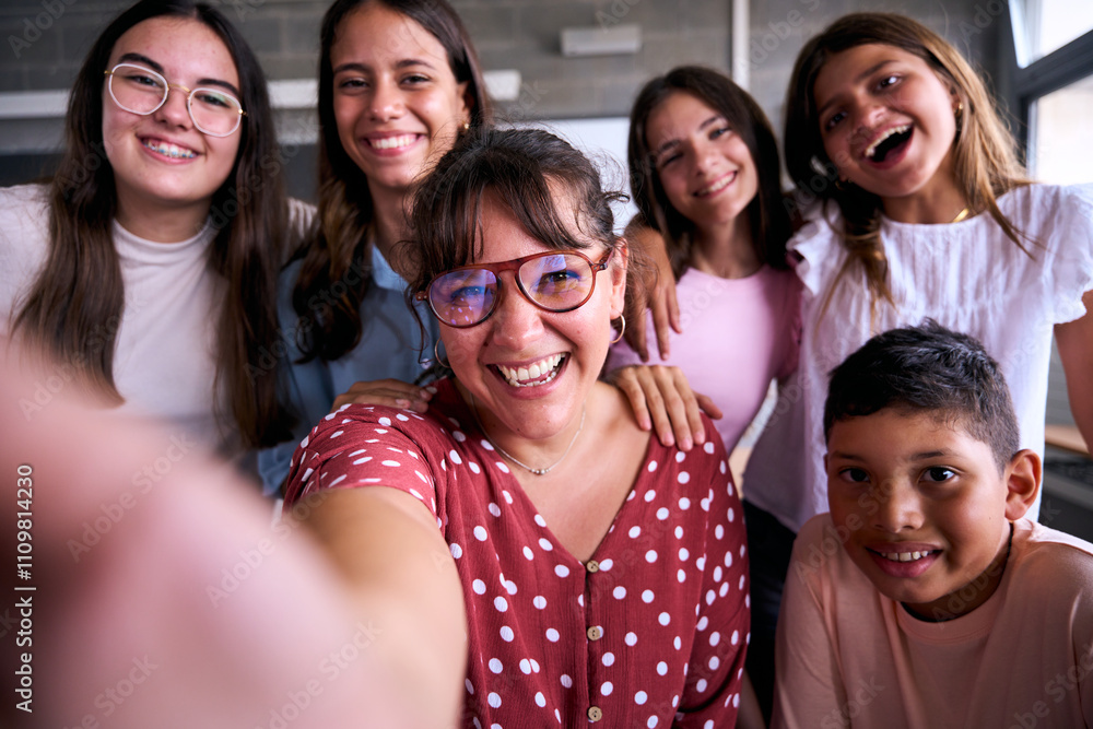 Selfie portrait of joyful elementary school small group of student with teacher looking smiling at camera. Diverse pre-adolescents people posing together for photo in support classroom. Back to school Selfie portrait of joyful elementary school small group of student with teacher looking smiling at camera. Diverse pre-adolescents people posing together for photo in support classroom. Back to school