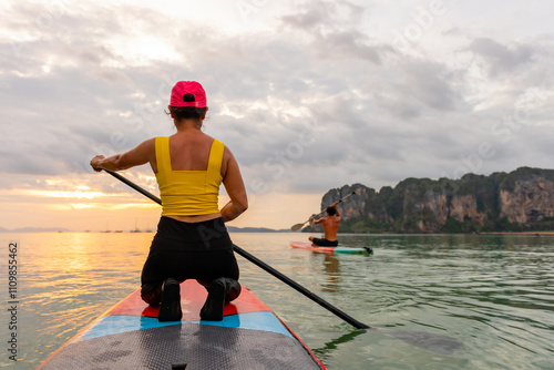 Photography Water sports paddle boarding on summer beach holiday vacation