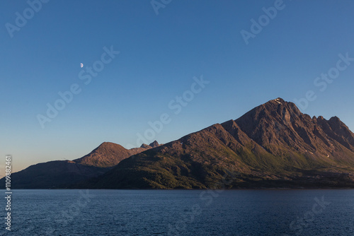 Moonrise at Sea Over the Mountains During Mid Summer in Norway When the Sun Never Sets, From the Deck of a Cruise Ship