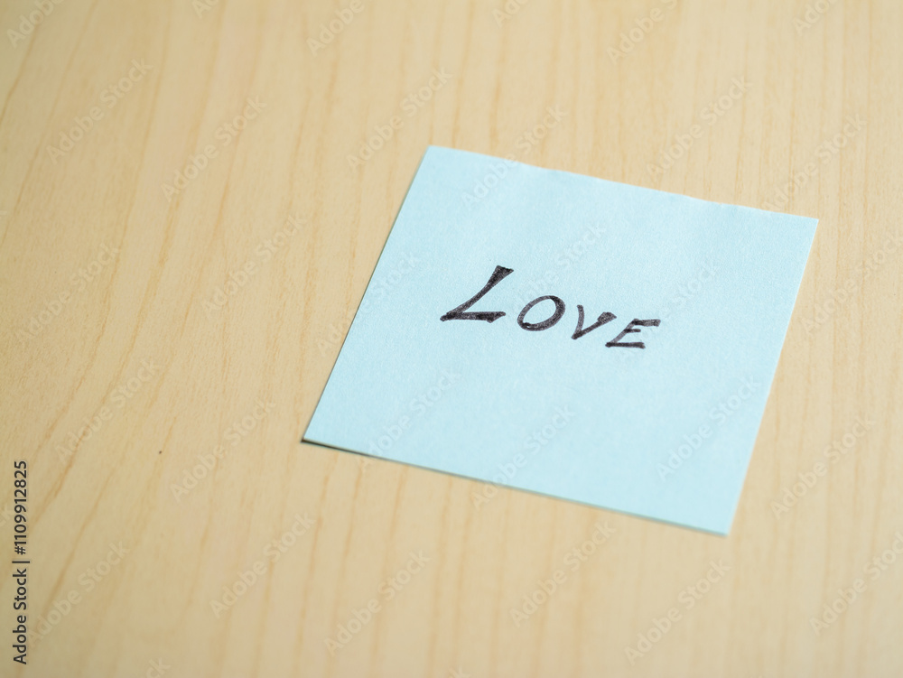 Sticky note love in a minimalist home office creative content & emotional expression Sticky note love in a minimalist home office creative content & emotional expression