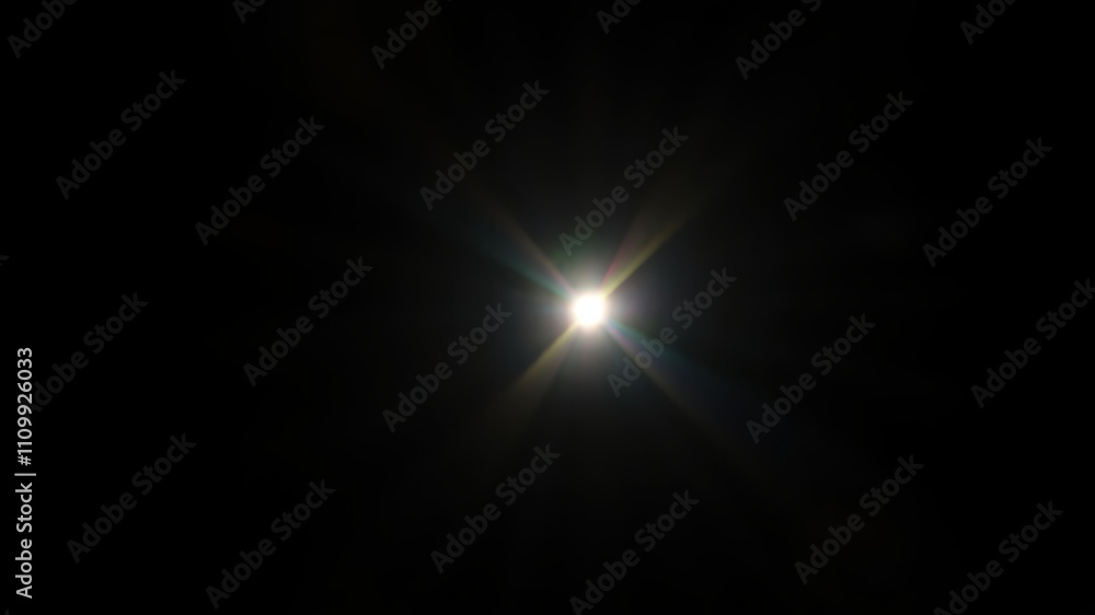 A Brilliant Starburst of Light Radiates from a Single Point in the Center of a Dark Background A Brilliant Starburst of Light Radiates from a Single Point in the Center of a Dark Background