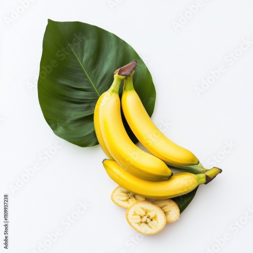 A bunch of ripe bananas with leaves, isolated white background, minimalism art style photo