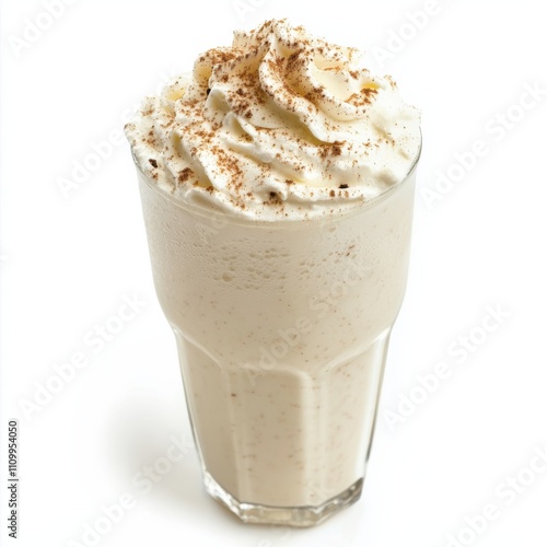 A creamy coconut milkshake with a sprinkle of cinnamon, isolated white background, impressionistic art style photo