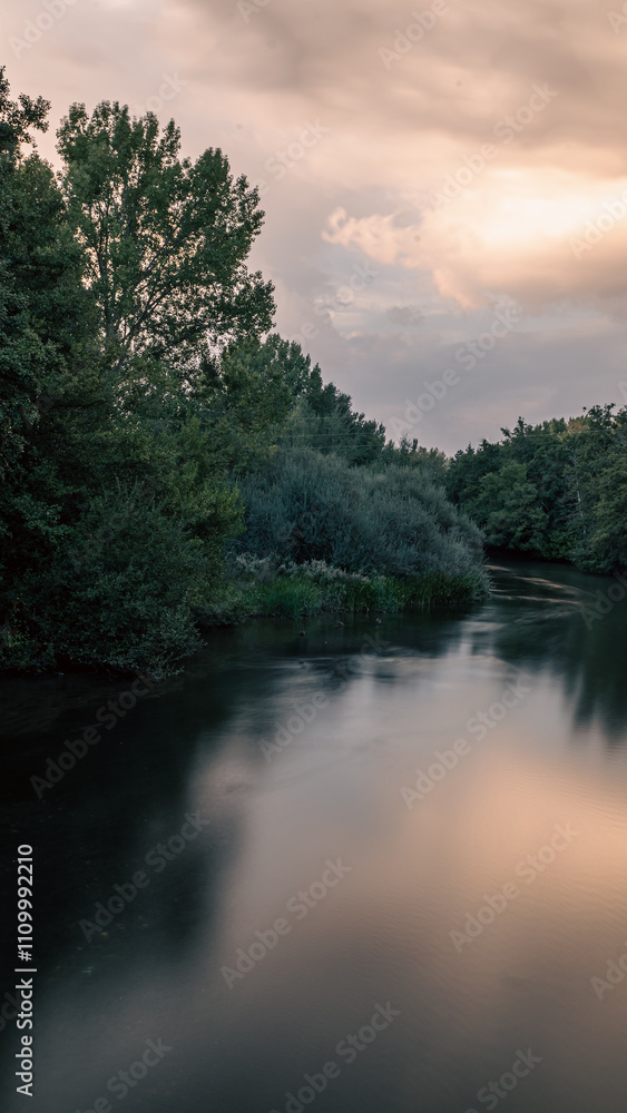 River Carrion in the El Plantio Park in the city of Carrion de los Condes in Palencia, Spain in 2024.