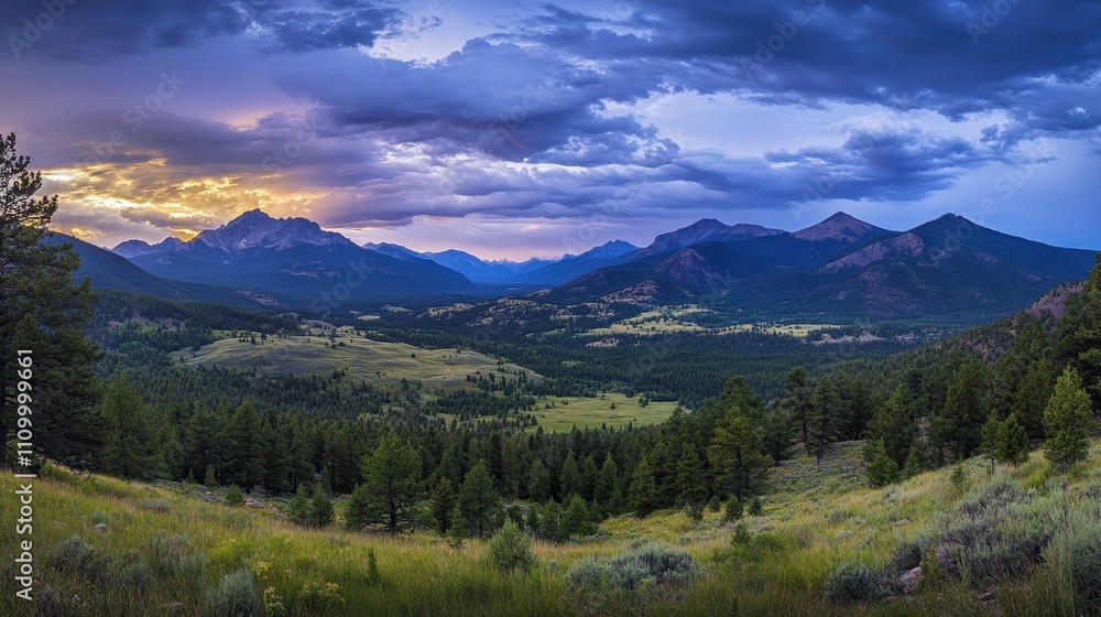 A mountain range with a cloudy sky in the background A mountain range with a cloudy sky in the background