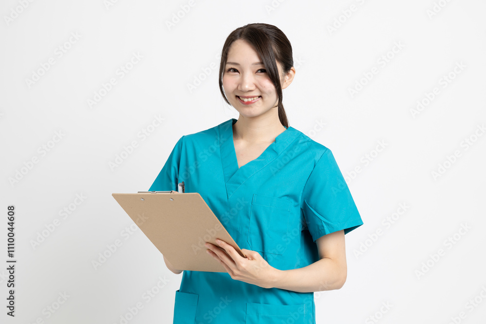 手術着を着た女性の医者 手術着を着た女性の医者