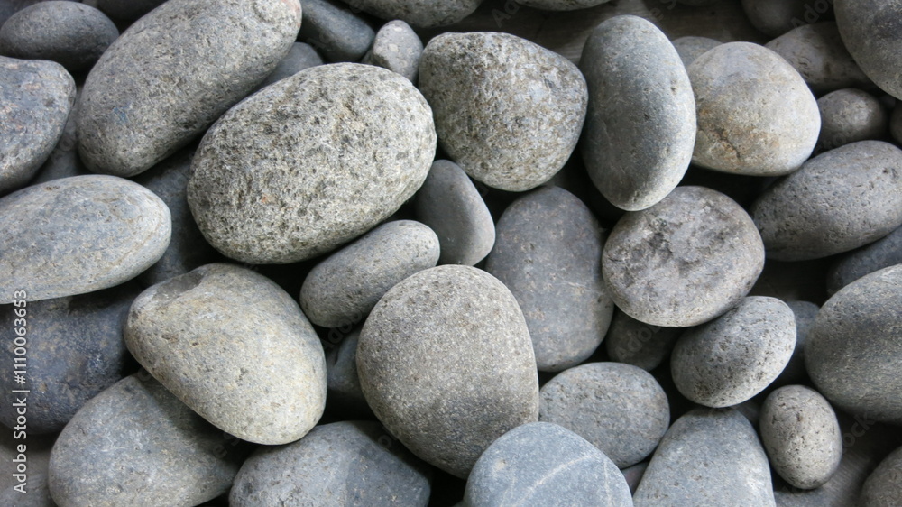 The background of pebbles arranged into a background The background of pebbles arranged into a background