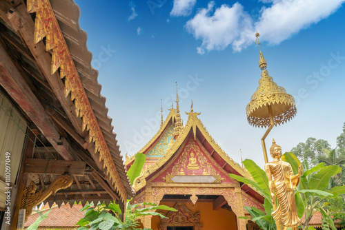 figure of Buddha and Buddhist palace in Xishuangbanna,China photo