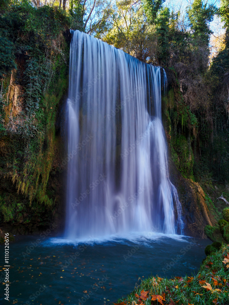 Fototapeta premium Scenic view of waterfall in forest,Monasterio de Piedra,Spain