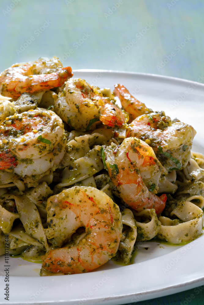seafood pasta in pesto sauce