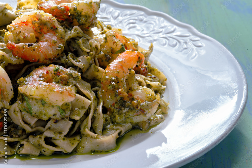 seafood pasta in pesto sauce