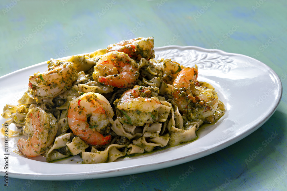 seafood pasta in pesto sauce
