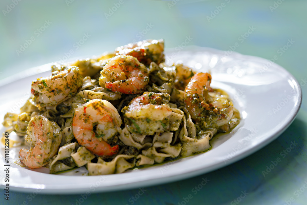 seafood pasta in pesto sauce