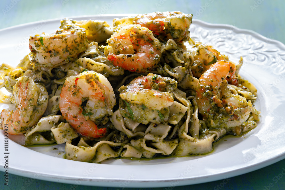 seafood pasta in pesto sauce