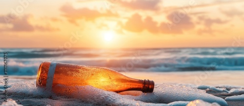 Sunset over ocean with a glass bottle washed up on the shore creating a serene and nostalgic beach scene.
