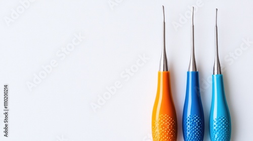 Interdental brush set featuring vibrant handles designed for effective oral hygiene on a clean white background photo