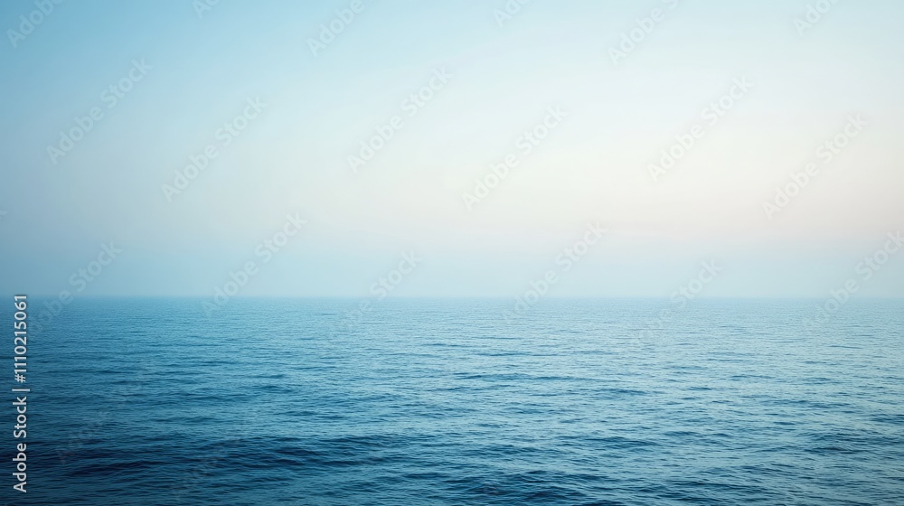 Calm and Serene Ocean View Under Clear Blue Sky at Dusk Calm and Serene Ocean View Under Clear Blue Sky at Dusk