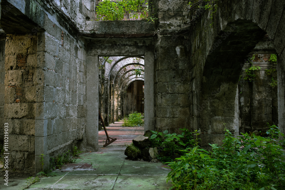 Naklejka premium Inside an old abandoned building in Intramuros, Manila