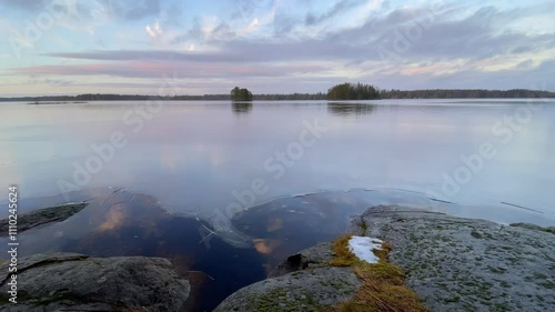 Tranquil and Serene Waterscape Featuring Beautiful Islands Under a Peaceful Dusk Sky