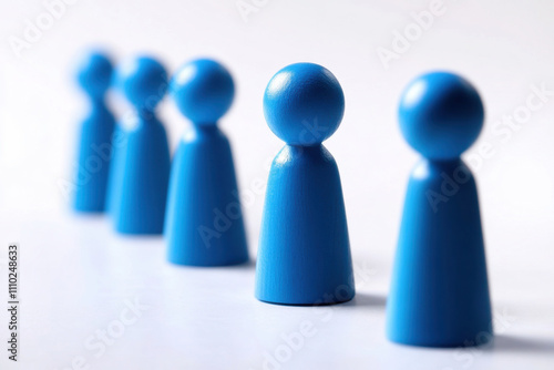 Four identical blue game pieces arranged in a row on a plain white background