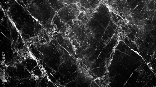 High resolution black marble texture background with striking white veining for elegant design applications