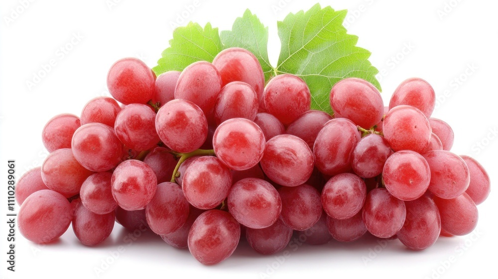 Fototapeta premium Fresh ripe red grapes with green leaves isolated on white background showcasing vibrant colors and natural textures of the fruit.