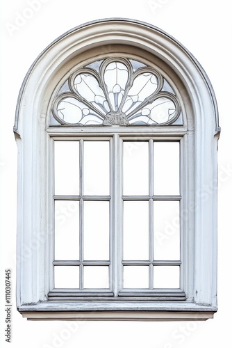 Ornate arched window, white frame, glass panes.