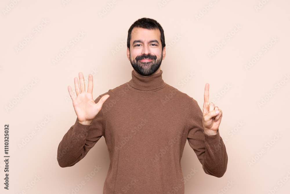 Fototapeta premium Man over isolated background counting six with fingers