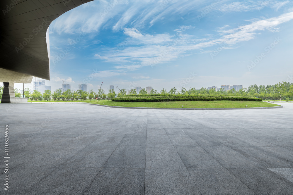 Fototapeta premium Empty brick floor and city skyline