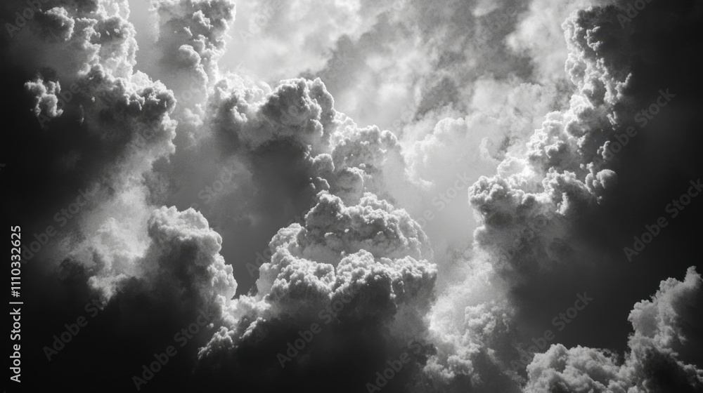 Fototapeta premium Dramatic Black and White Clouds with Rays of Light Peeking Through
