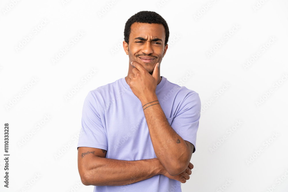 African American handsome man on isolated white background thinking an idea while looking up African American handsome man on isolated white background thinking an idea while looking up