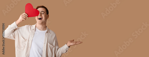 Young man with red paper he...