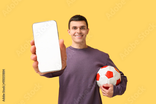 Young man with soccer ball ...
