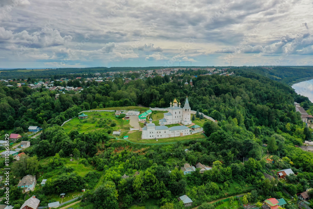 The Klyazma River and Gorokhovets lie peacefully in lush hills, creating a majestic landscape. The Klyazma River and Gorokhovets lie peacefully in lush hills, creating a majestic landscape.